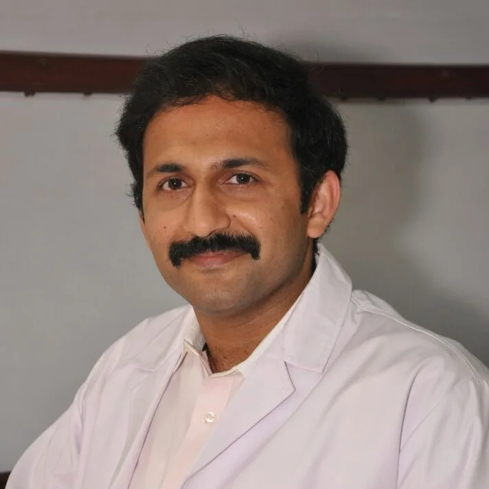 Dr. T. Karthik